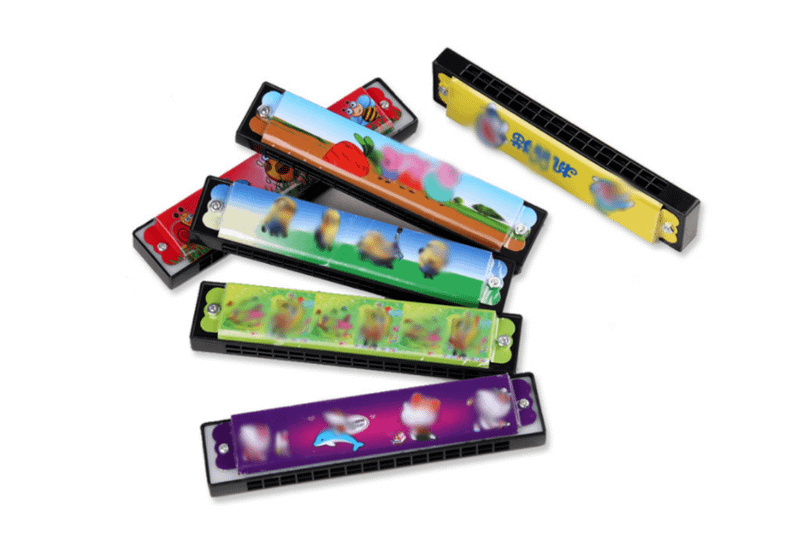 Plastic Harmonica Games and Toys One Dollar Only